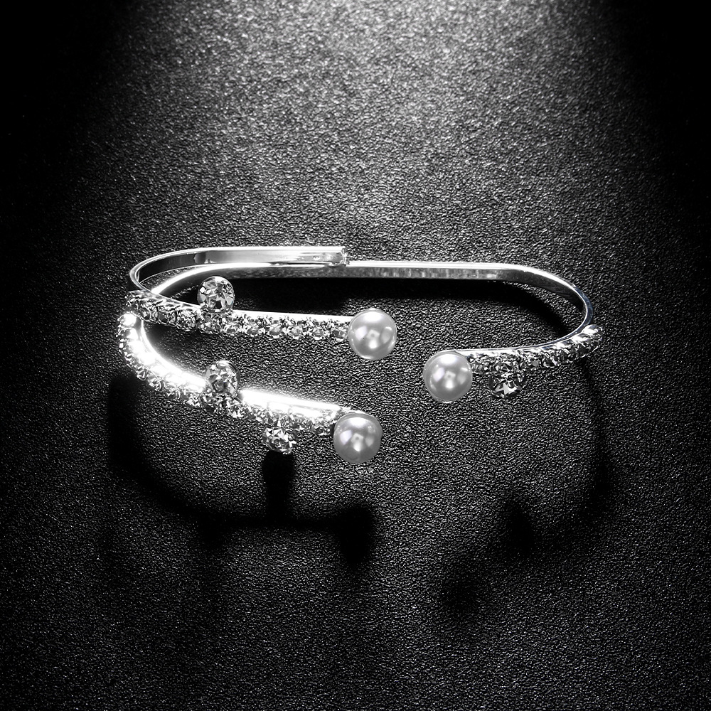 Juegos de joyería de lujo europeos y estadounidenses temperamento simple pendientes de zircon abierto brazalete anillo accesorios conjunto de joyería