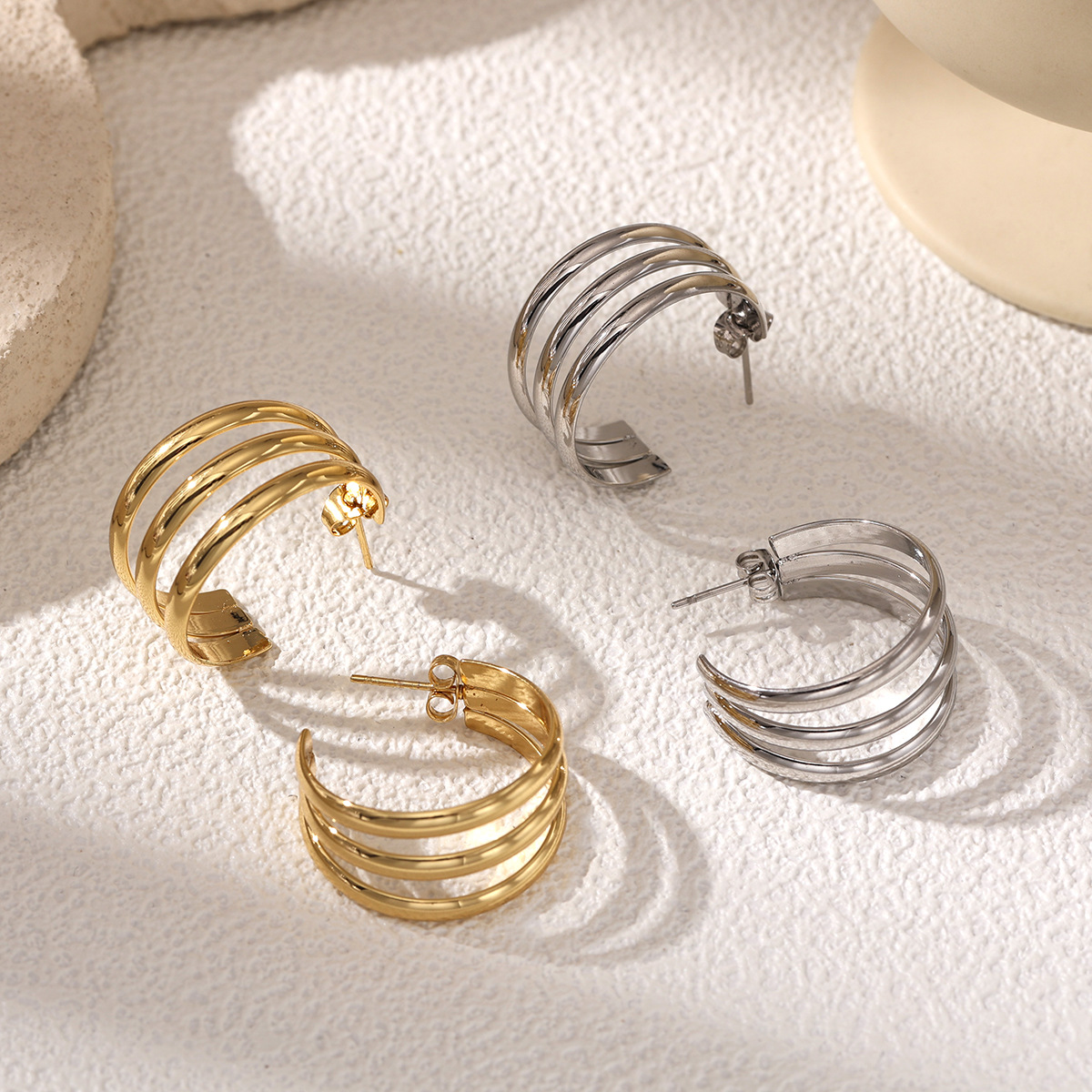 TENA europa y americana pendientes de acero inoxidable lujoso ligero de alta calidad sensación de acero dorado HOOP transfronterizo joyas de acero de titanio