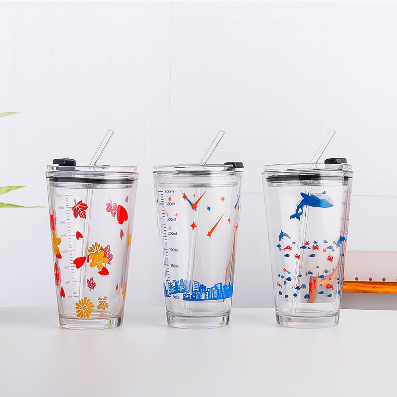 Creative influencer-designed straw-equipped glass cups for home use—perfect for breakfast, milk, summer cold drinks, and juice; logo-printed cups available for wholesale.