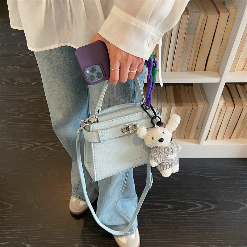2026 nueva sensación diaria de bolsos portátiles de Kelly, mujeres de moda simple, versátil, lujoso, ligero, de viaje, una sola bolsa de hombro, moda