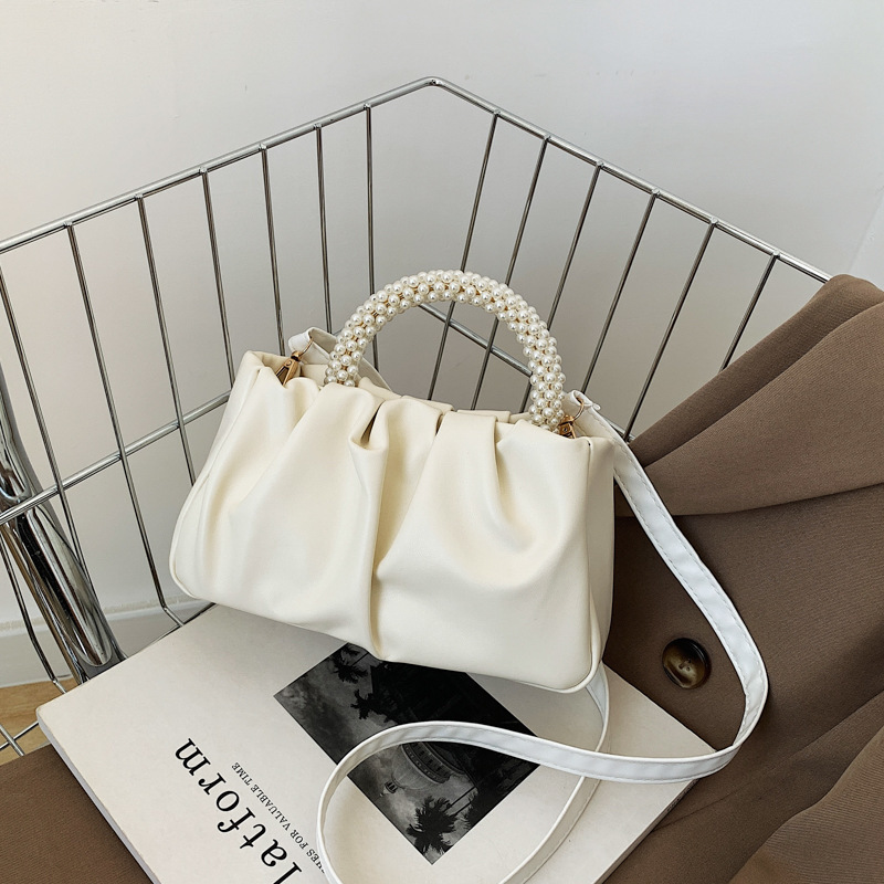 Bolso de mujer de color sólido 2022, nuevo bolso de nube de verano, bolso de mano suave de moda, bolso de hombro simple de estilo extranjero.