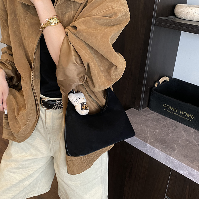 Alta sensación retro bolso de mano de mujer 2025 nuevo hombro mochila de textura esmolada bolso de bolsillo