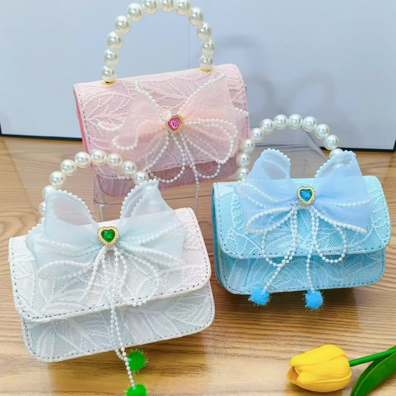 Bolso de princesa con lazo Bolso de perla Bolso de mensajero de cadena Bolso de hombro para niñas Bolso de niño con fragancia pequeña Bolso de accesorios