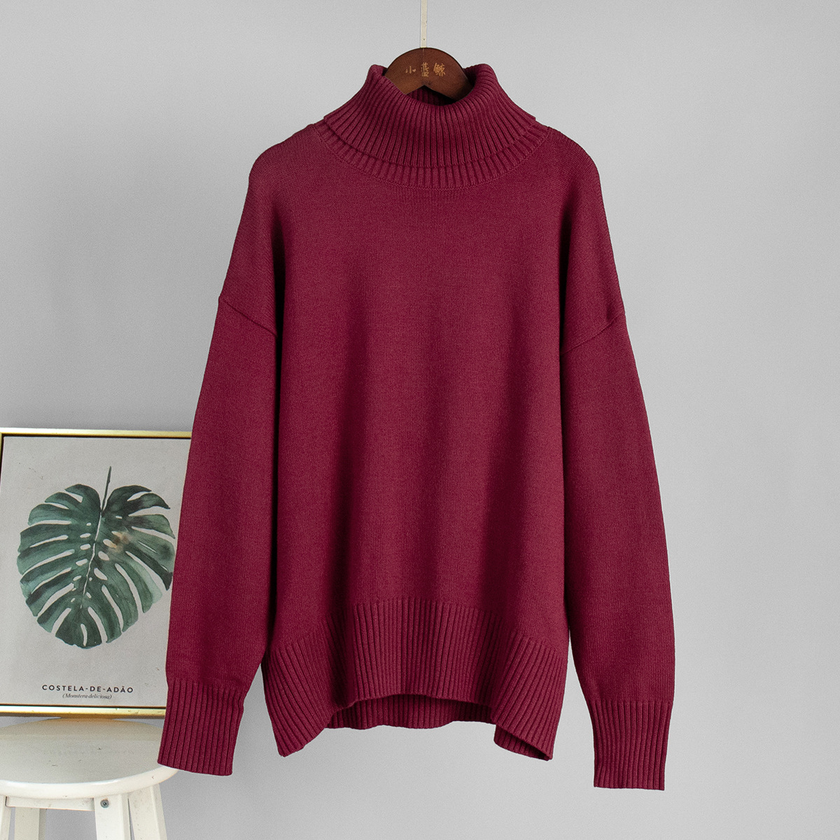 Suéter de cuello alto de Amazon transfronterizo para mujer 2025 Suéter suelto de otoño e invierno europeo y americano Suéter clásico de color sólido de todo fósforo