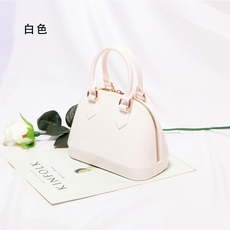 2025 primavera y verano estilo caliente moda casual niños dulces bolsa de gelatina mini bolso de mensajero de un solo hombro variedad al por mayor