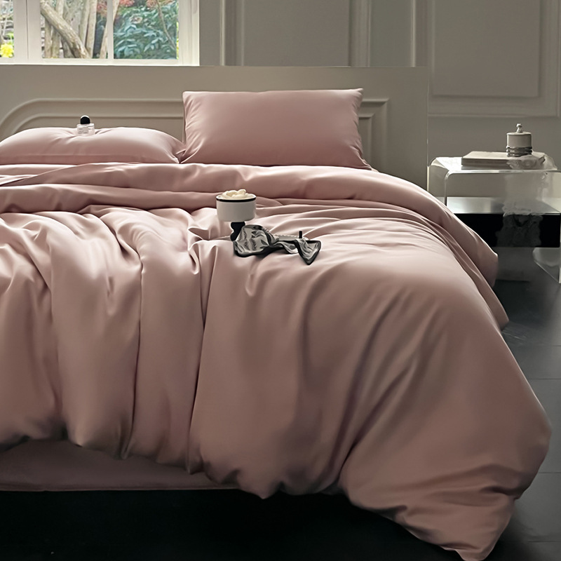 Juego de cama de verano de cuatro piezas de seda de hielo de lujo ligero 2025 nueva funda de edredón sábana sábana sábana ropa de cama desnuda sedosa