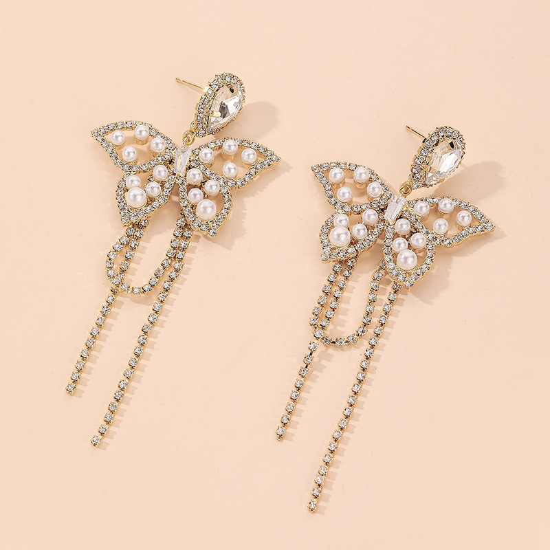 925 Silver Needle Micro Inlay Rhinestones Pearl Water Drop Butterfly Tassel Eardrops European And American Ins Fashion Personalized And Temperamental Earrings Women display picture 3