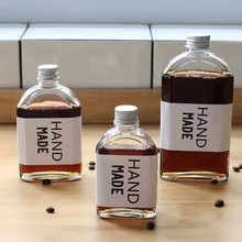 现货创意咖啡奶茶果汁饮料扁酒瓶冷翠透明玻璃斜肩铝盖弧形小