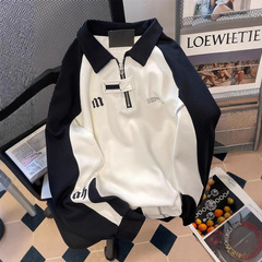 アメリカのレトロな学院風の半ファスナーのpolo襟の女性の高級感のhiphopの潮のブランドの白黒は色の上着にぶつかります。