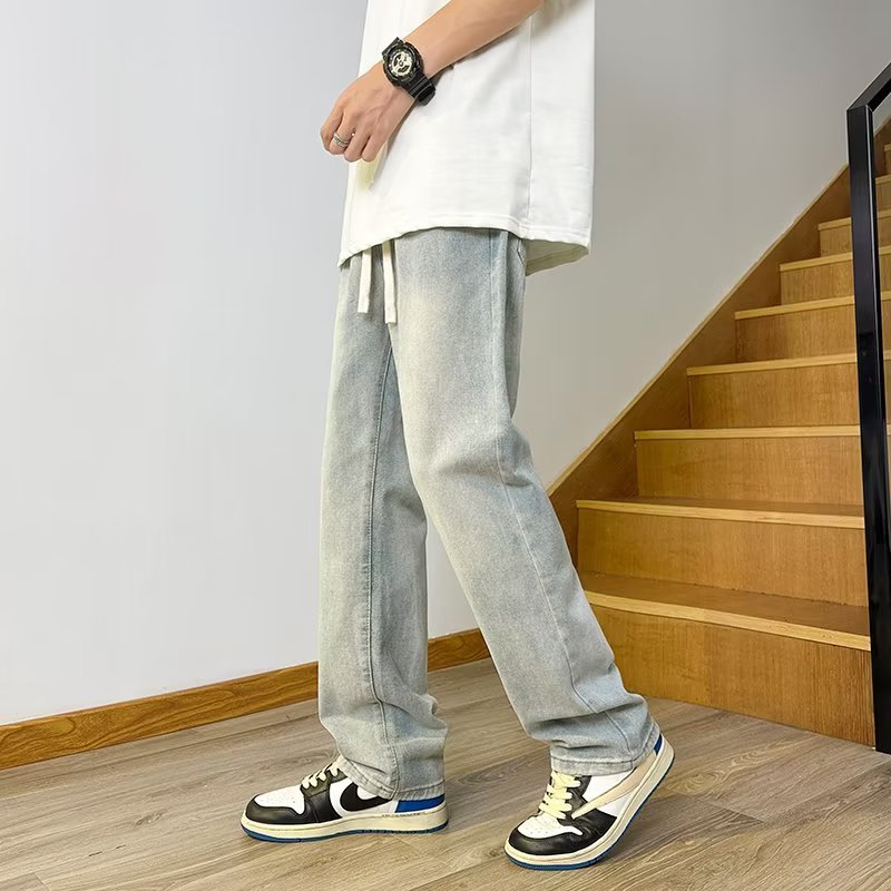 Vaqueros americanos, pantalones teñidos de barro amarillo de seda de hielo viejos lavados de verano para hombres, pantalones rectos sueltos de la marca de moda de la calle principal