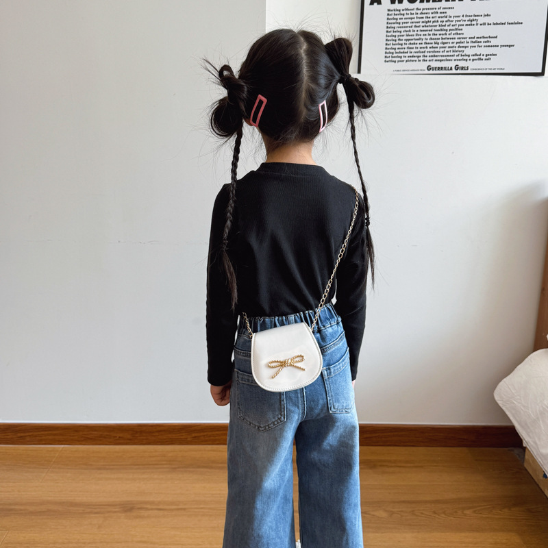 Nuevo bolso de cadena para niños lindo lazo bolso de mensajero para bebé simple color sólido láser brillante bolso de mensajero para niñas