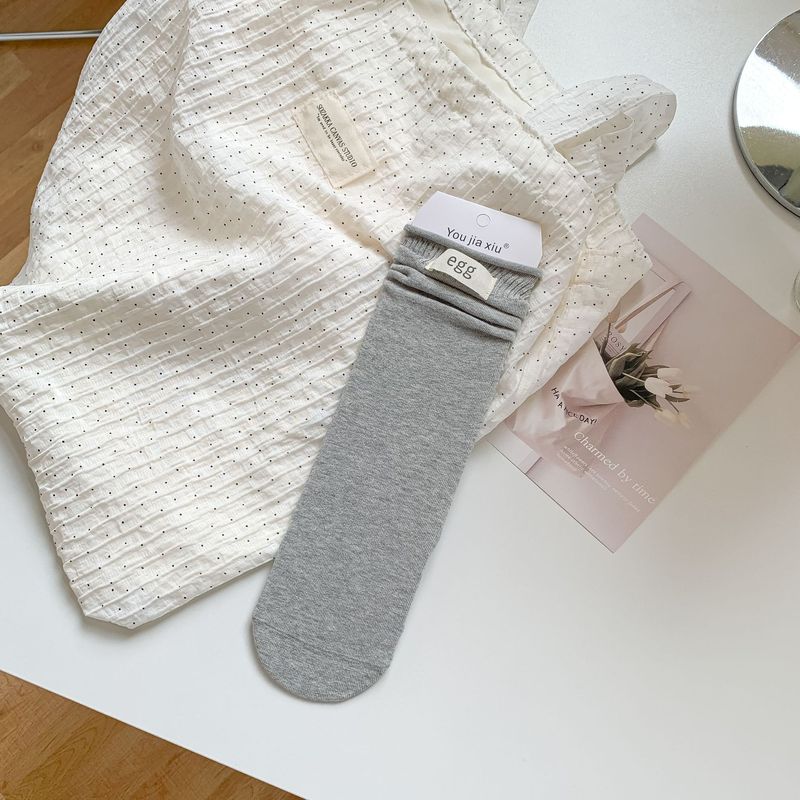 秋冬款袜子女纯棉韩系egg布标纯色潮袜卷边松口中筒袜无骨堆堆袜|undefined