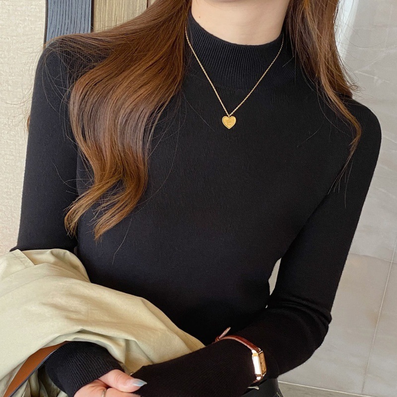 高級な洋気の流行の半高襟のニットの女性の秋冬の上着は底を打って身を修める長袖はやせている中で襟の内の婦人服を現します。|undefined