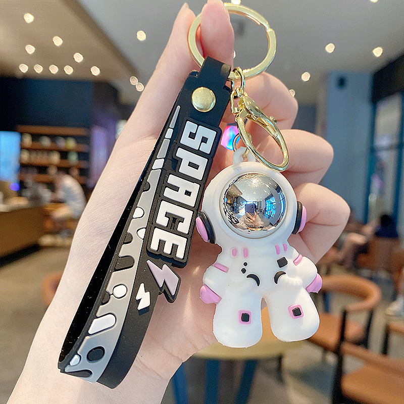 Dibujos animados cosmonauta astronauta astronauta muñeca llavero accesorios de automóvil creativos lindo bolso de pareja colgante regalo