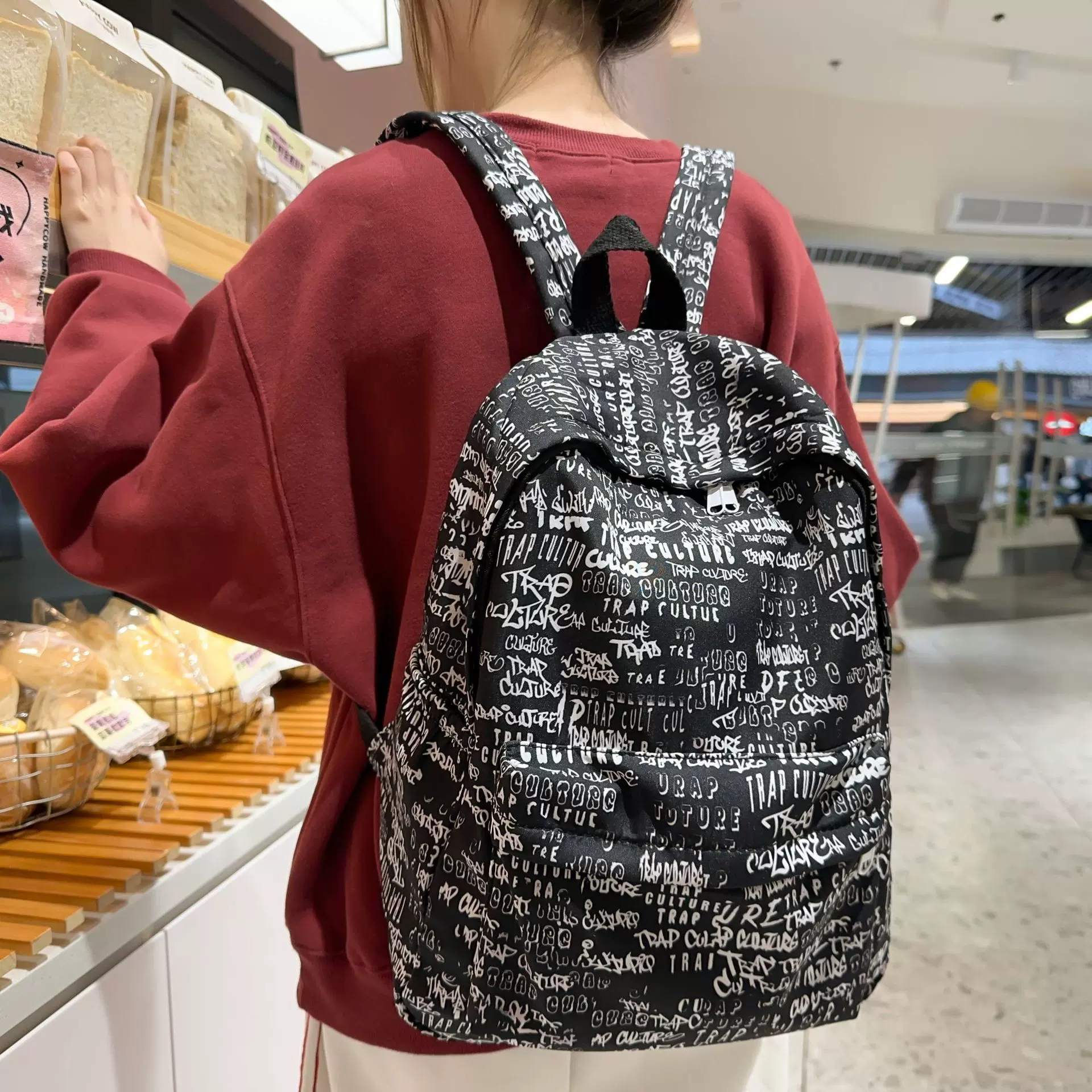 街头潮流涂鸦双肩包韩版时尚大容量背包男女初中生高中学生书包