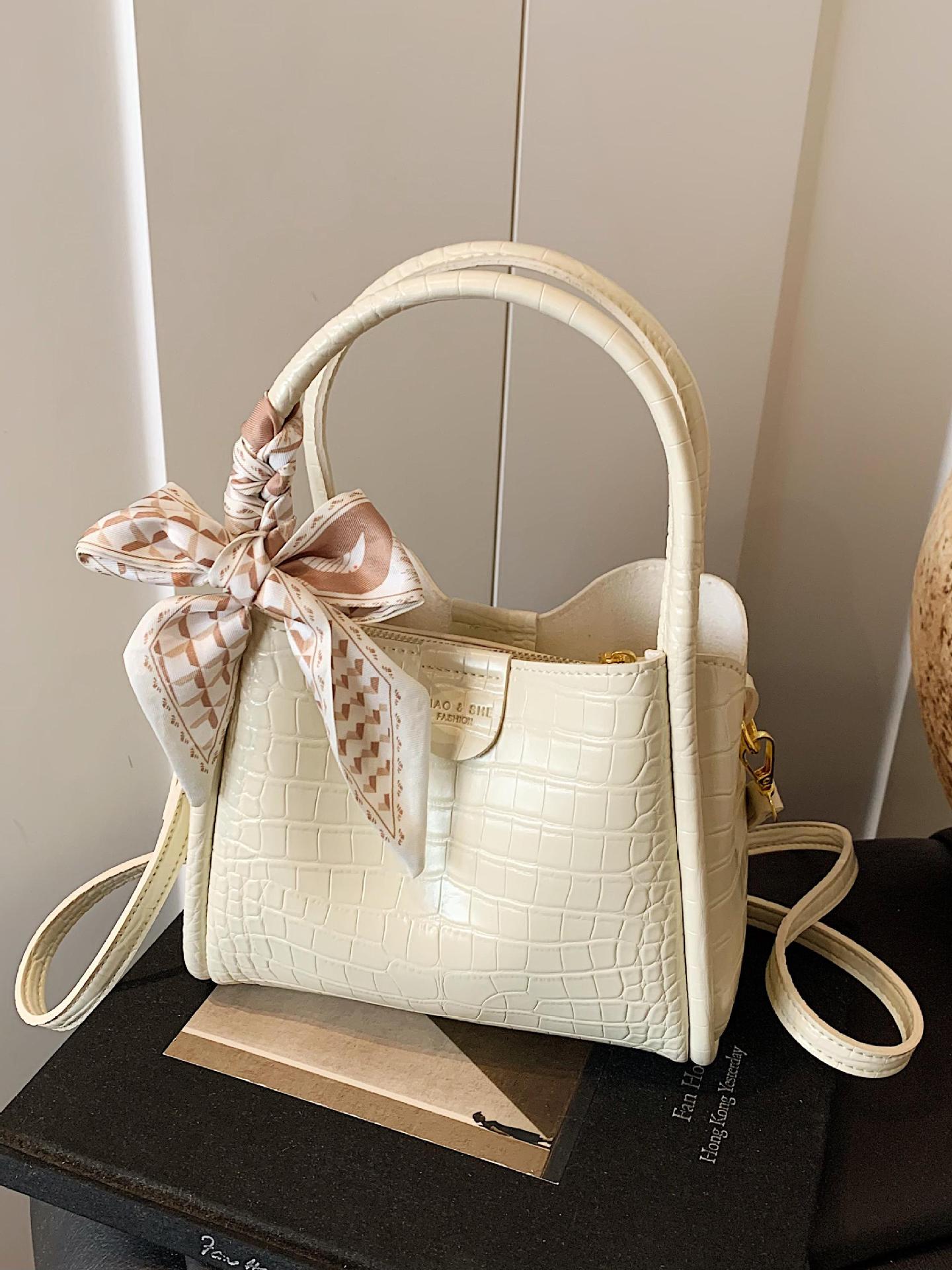 Bolso de mano de canasta de verduras de alta gama de nicho para mujer 2025 nuevo producto de comercio exterior bolso de cubo con patrón de cocodrilo bolso de mensajero de cercanías