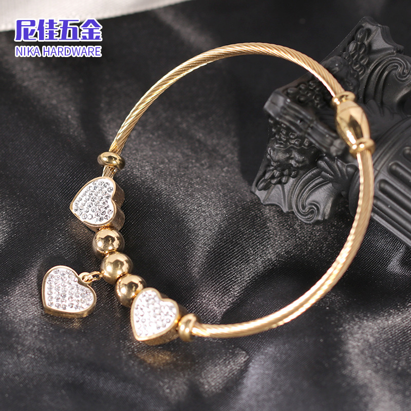 Pulsera personalizada de acero de titanio chapada en oro 18K, incrustada con diamantes y cuentas magnéticas