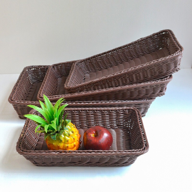 新商品の果物は藤のかごの台所の野菜を洗うかごの水たまりのかごの長方形のパンのかごを陳列して藤のパンの収納かごをまねます。|undefined