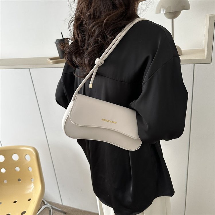 Bolso de diseño de nicho para mujeres 2024 verano nueva moda moda popular mochila de hombro bolso de hombro de viaje casual bolso de brazo