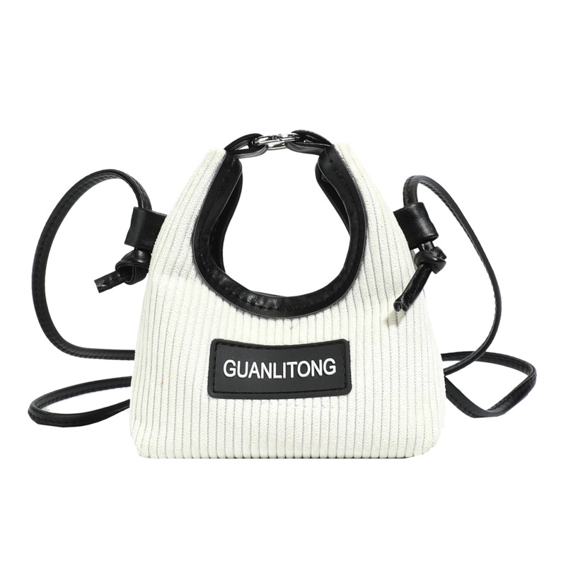 Bolso de niña de color sólido coreano lindo mini mochila de bebé otoño invierno nuevo bolso de hombro para niños de lana