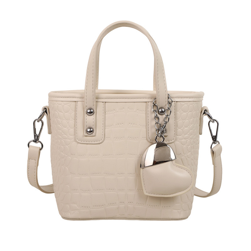 Bolso de alta calidad con textura 2025 verano nuevo estilo bolso de hombro con patrón de cocodrilo moda amor bolso de mensajero mujer
