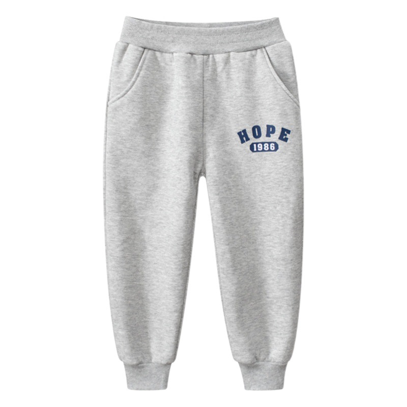 27 niños estilo coreano ropa para niños pantalones largos para niños transfronterizos letras deportes para niños Pantalones deportivos con cordones de lana entrega de una sola pieza