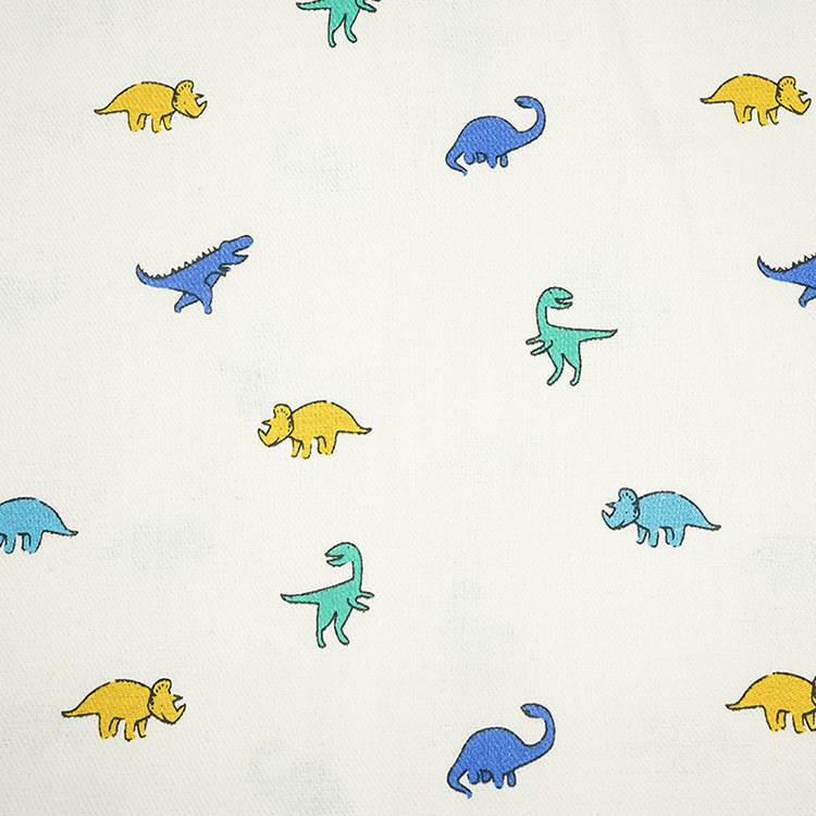 Roll textiles al por mayor 40s dinosaurios dibujos animados patrón de impresión digital ropa de algodón