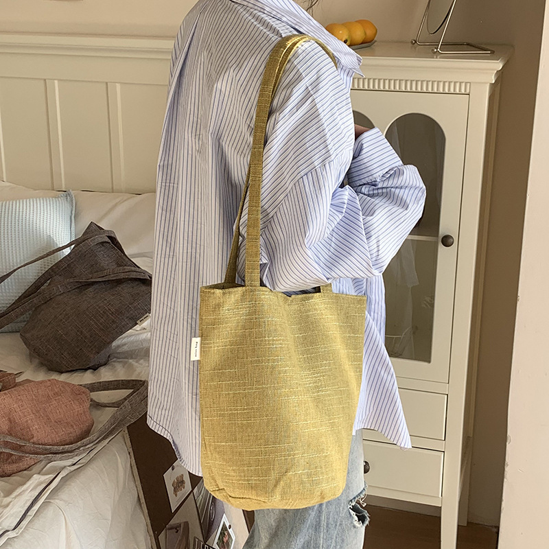 Bolso de mujer nuevo cubo de hombro material de lana versátil textura de ocio bolso de mano de viaje bolsa de tela de gran capacidad mochila