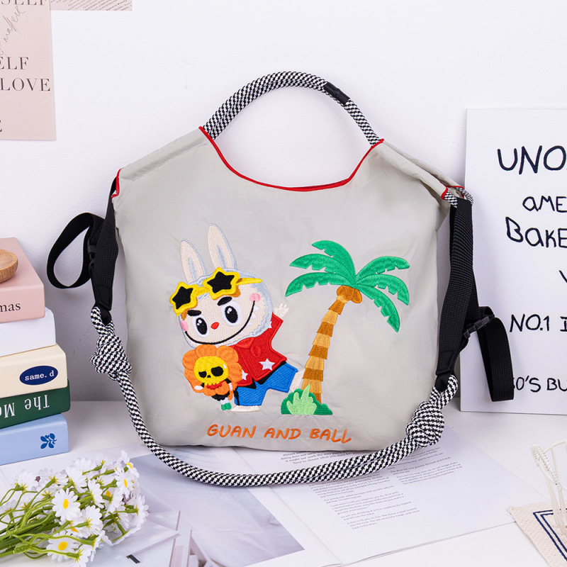 [アップグレードジッパーバッグ] 2025 新しい刺繍ナイロン屋外防水日本製多用途調節可能なクロスボディバッグ女性用|undefined