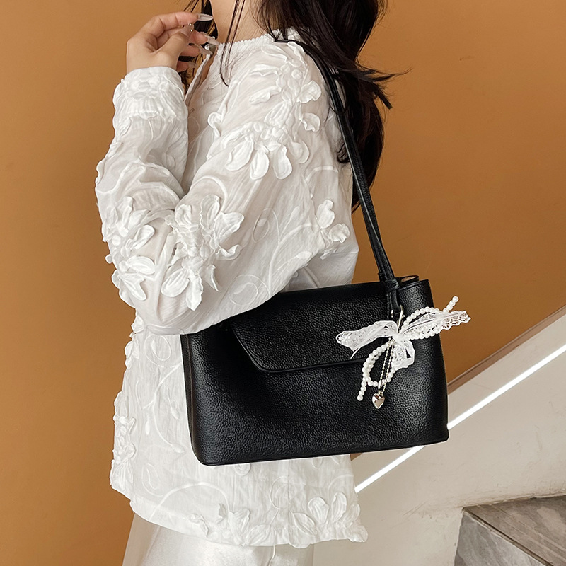 Bolso Tote de cercanías todo-fósforo de nicho retro transfronterizo para mujer 2025 primavera nuevo estilo estilo occidental bolso de axila de un solo hombro de gran capacidad