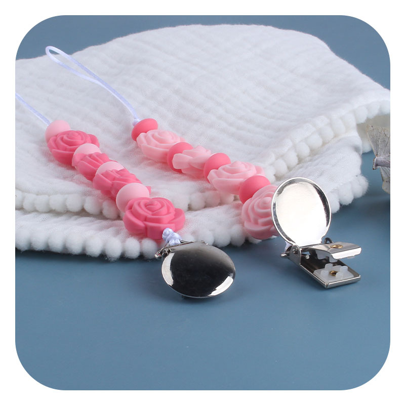 Suministros para bebés nuevo clip de chupete de hierro redondo mordedor para bebé Cadena de chupete de silicona Rosa cadena anti-caída