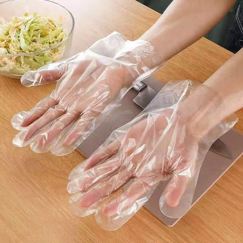 Factory direct sales disposable gloves food catering baking beauty salon plastic transparent thickened PE gloves batch