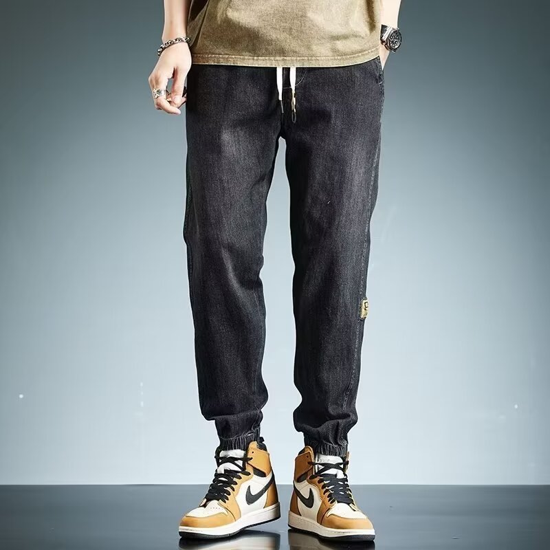 2024 primavera y otoño pantalones vaqueros de cintura elástica todo fósforo para hombres, pantalones de pierna ancha rectos sueltos para adolescentes de la calle principal