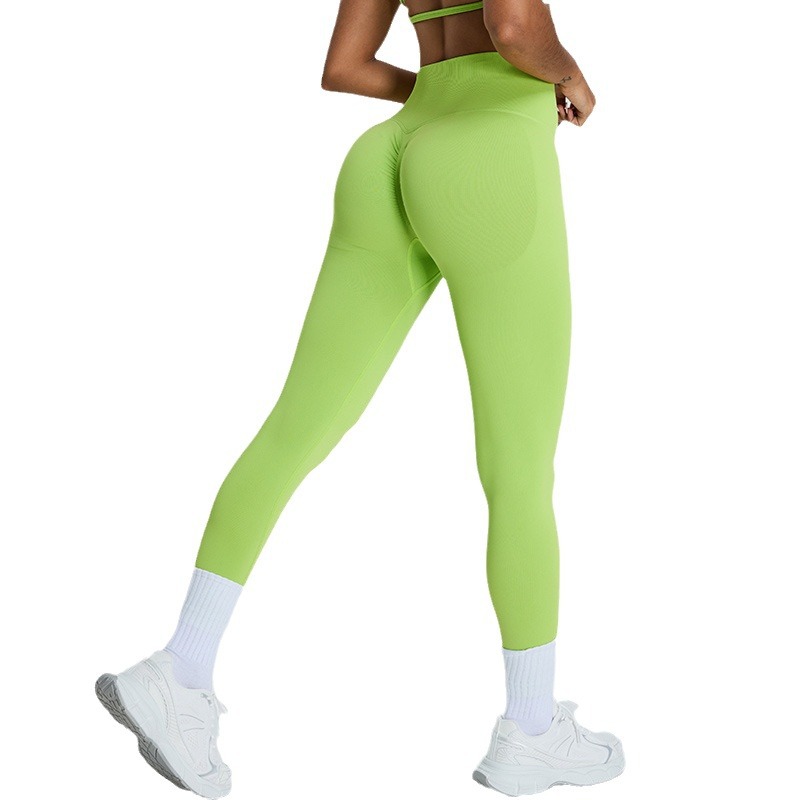 Pantalones de yoga de cadera de melocotón sin costuras europeos y americanos, ropa de yoga de secado rápido para mujer, pantalones de fitness de cadera ajustados para abdomen