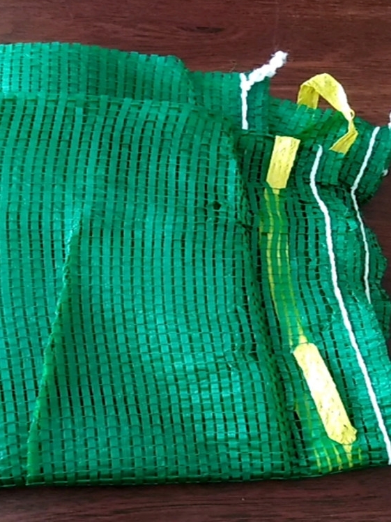 Naranja en bolsa de malla, naranja en bolsa de malla, pomelo en bolsa de malla, sandía en paquete, cebolla, patata, cuerda, bolsa de pollo