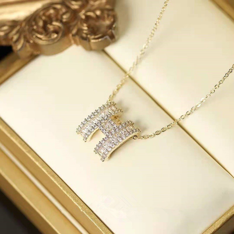 Gold letter necklace