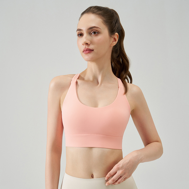 Primavera y verano nuevo estilo desnudo amortiguador sujetador deportivo mujer hueca hebilla hermosa espalda fitness yoga ropa interior correr alta intensidad