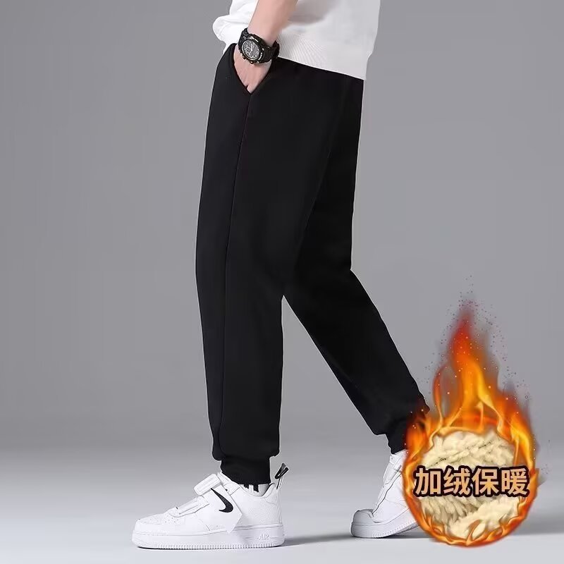 秋冬のベルベットのカジュアルな足首のズボンの男性の日本風の羊の小毛の大きいサイズのスポーツのズボンのゆったりとしたシンプルな純色のズボン