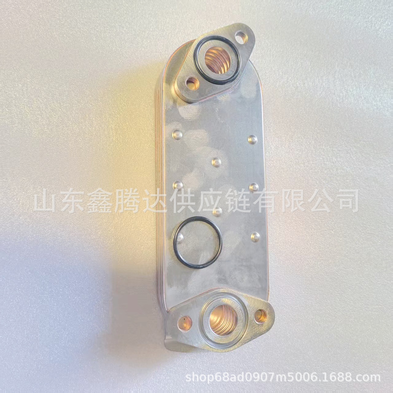 Factory Direct Supply of Engine Oil Cooler for Japanese Cars, Auto Parts Ok55114701 with 5-Layer Water Deflector