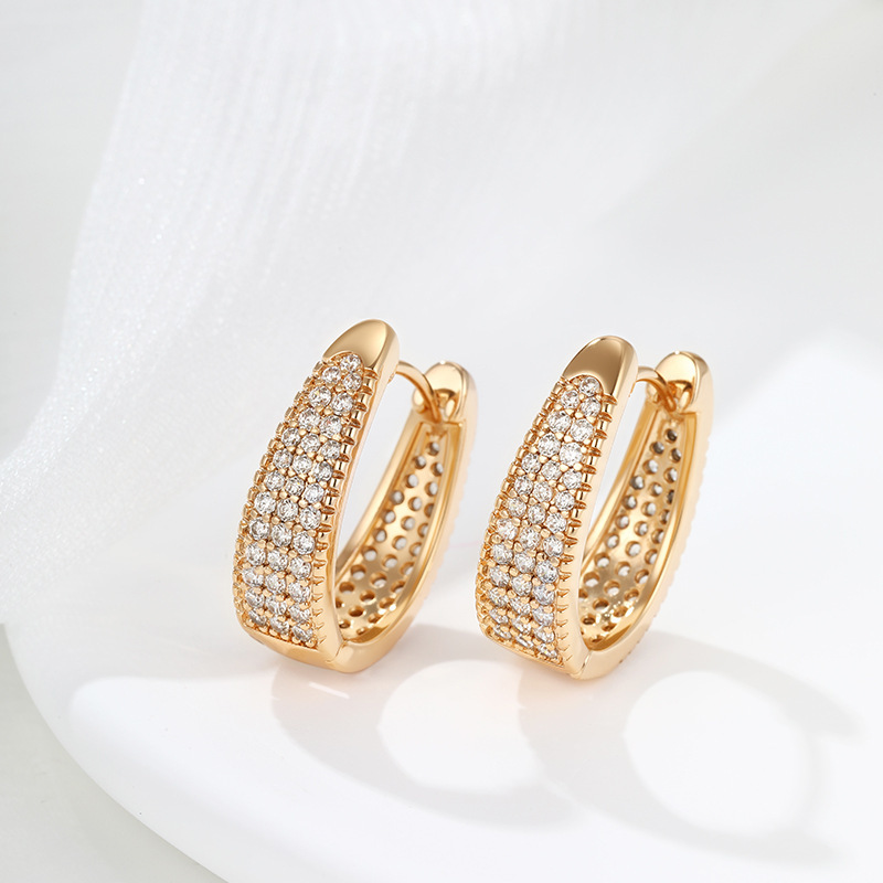 Pendientes de aro Xuping transfronterizos rusos de 18k con incrustaciones de diamantes, joyería de lujo ligero de alta gama al por mayor para mujer.