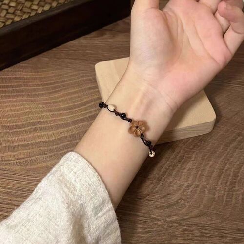 New Chinese-style retro wooden carved small peach blossom bracelet, women's peach wood braided cord, niche design, versatile national trend jewelry