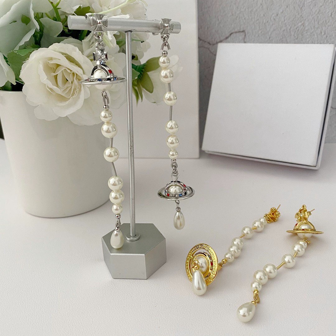 Asymmetrical three dimensional earrings pearl with tassels
