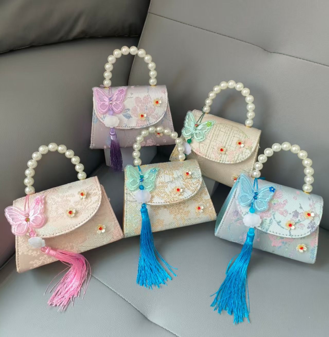 Bolsa portátil de la princesa de perlas estilo nacional arco de hombro bolso de cadena bolso pequeño bolso de cambio de Año Nuevo