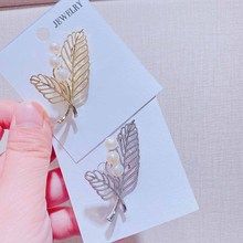 11435�n������I�δ���荕r���ػ����|�ﶬŮ���Ʒ�e�