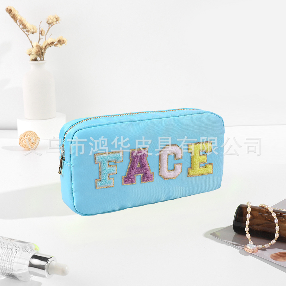 Transfronterizo amazon popular toalla bordada carta de nylon bolsa de cosméticos bolsa de almacenamiento de gran capacidad informal de las mujeres a prueba de agua