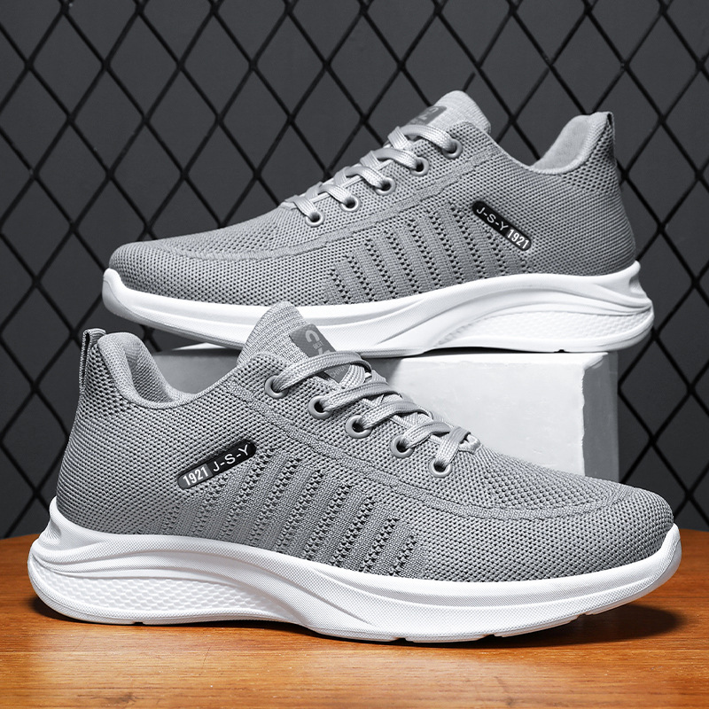Zapatilla de deporte para hombre primavera nueva superficie de malla tejida voladora transpirable zapatos individuales generación transfronteriza Fondo suave cómodo zapatos casuales zapatos de hombre