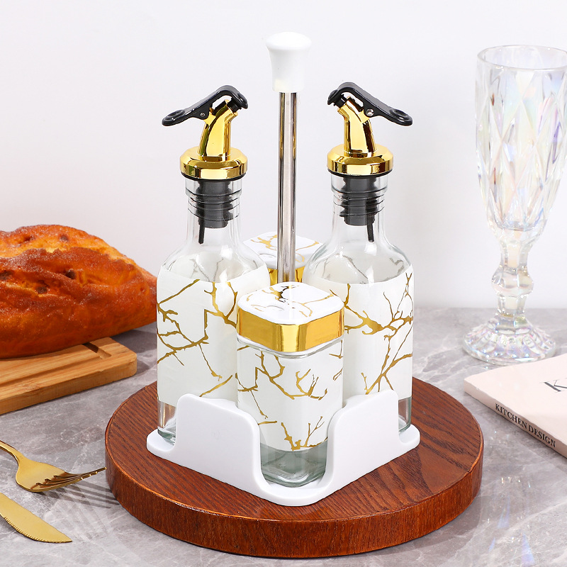Juego de cuatro piezas de olla de aceite, botella de condimento negro, juego de caja de condimento de cocina de vidrio, pimienta doméstica, botella de sal, olla de aceite sellada