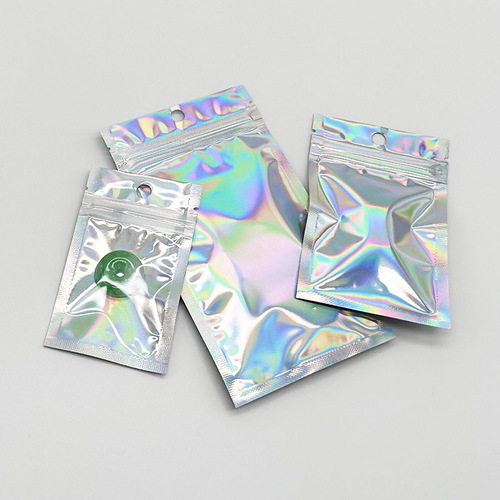 Manufacturer supplies laser yin and yang ziplock bags, stickers, cards, rainbow bags, brooches, jewelry, mobile phone cases, packaging bags