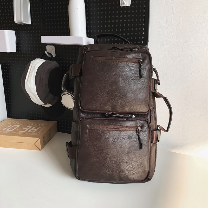 Nueva mochila de hombro de textura PU, color sólido, simple para hombres, bolsa de viaje corto, bolsa deportiva