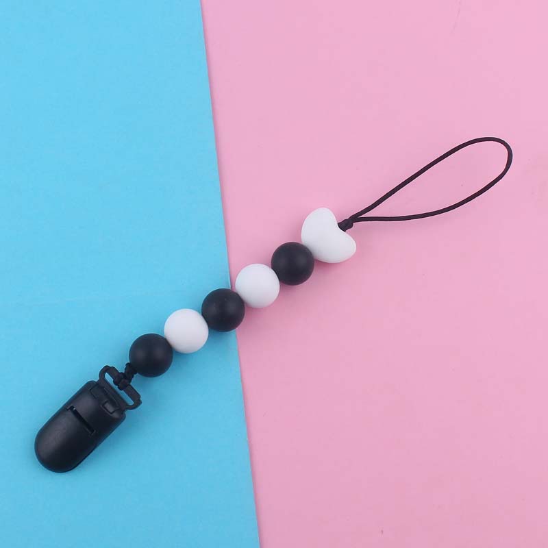 Nuevo bebé suministros de dibujos animados amor silicona DIY creativo macaron color serie mordedura cola molar pezón